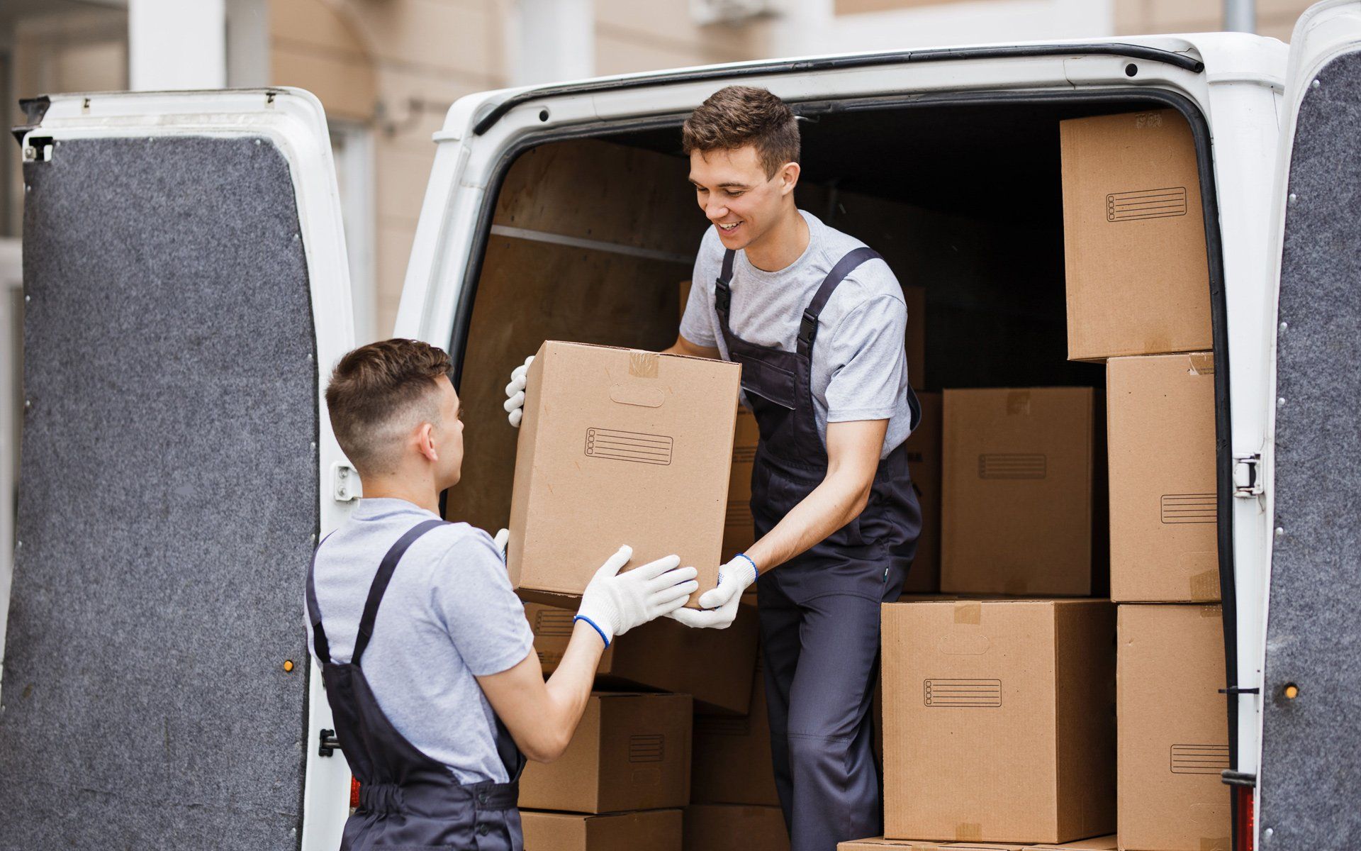 Delivery driver handing over a package
